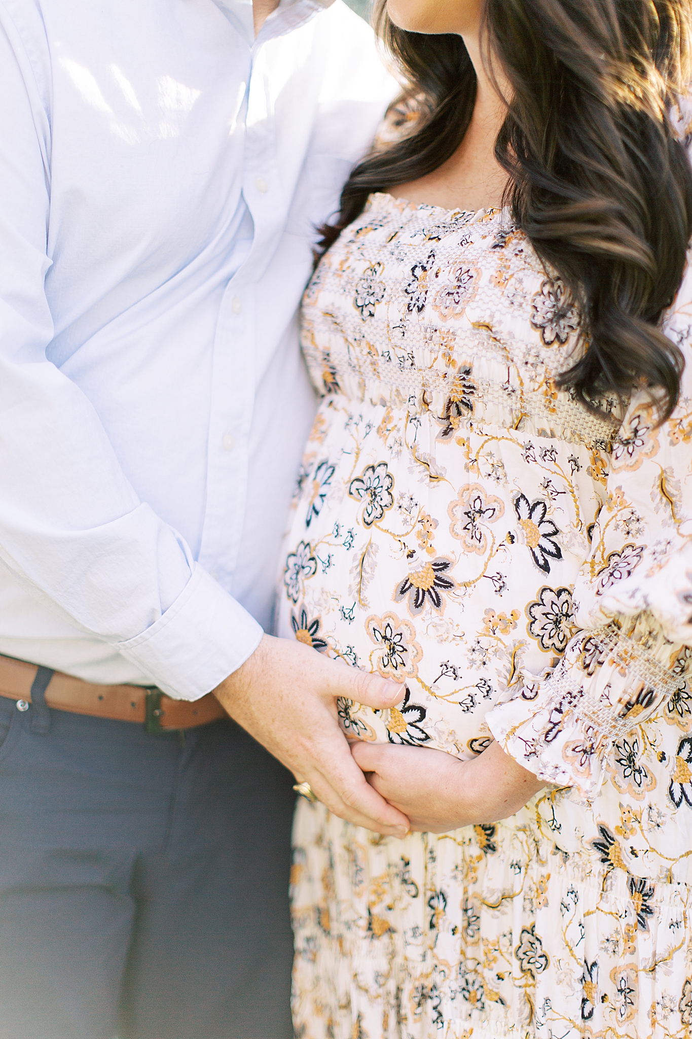 mom and dad hold belly during maternity portraits in Winston-Salem
