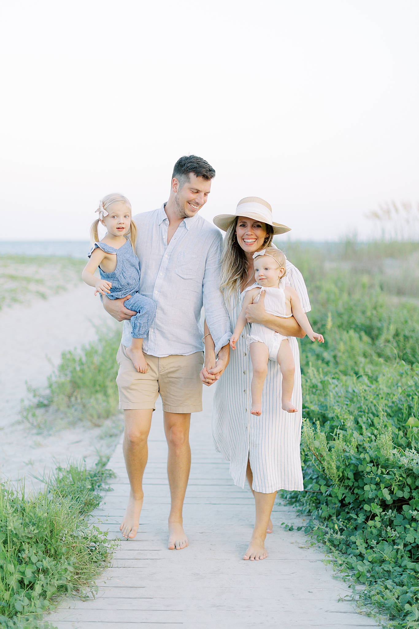 Sullivans Island family session with parents in neutral outfits