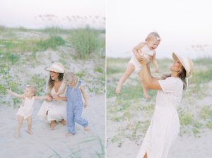 mom and two girls play in sand during Charleston family photos