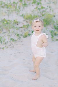 toddler plays in sand during Sullivans Island family session