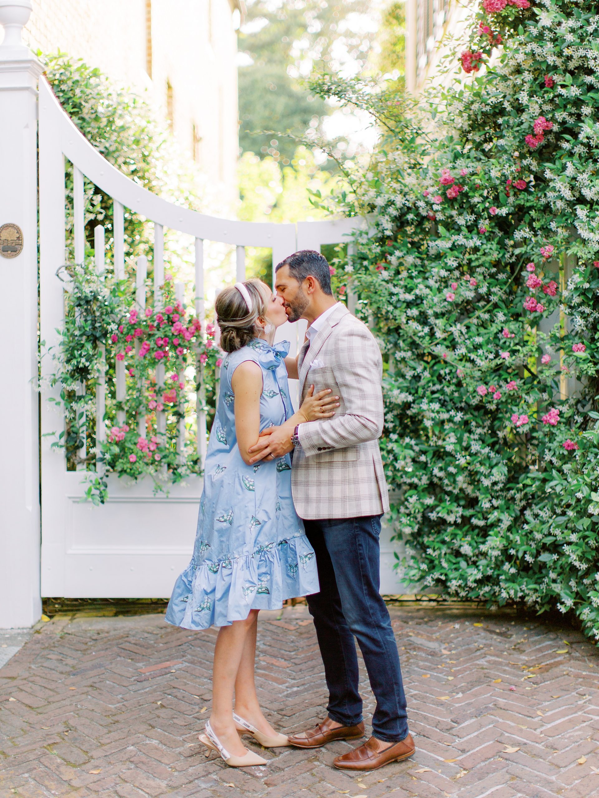 couple kisses after Charleston vow renewal on Church Street