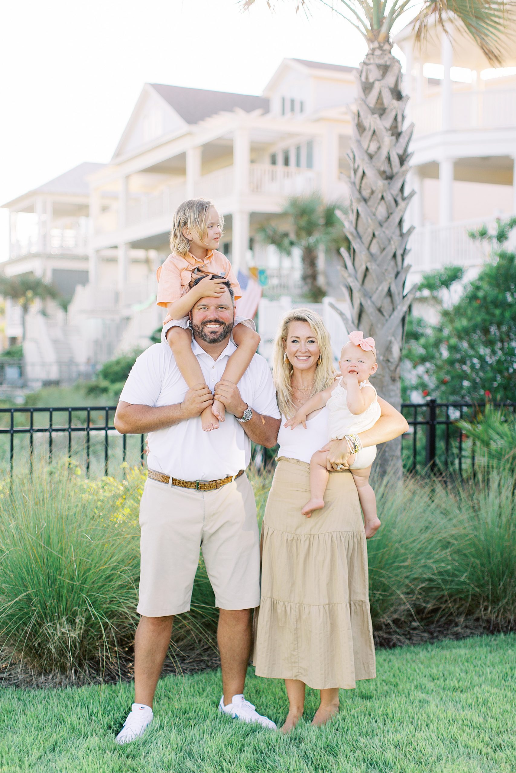 family of four poses during Isle of Palms family session