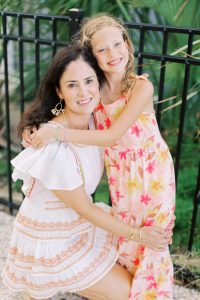 mom hugs daughter during Isle of Palms family photos