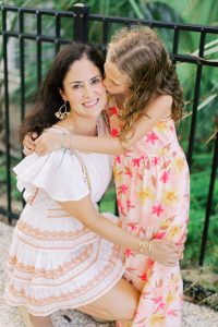 daughter kisses mom during Charleston family session