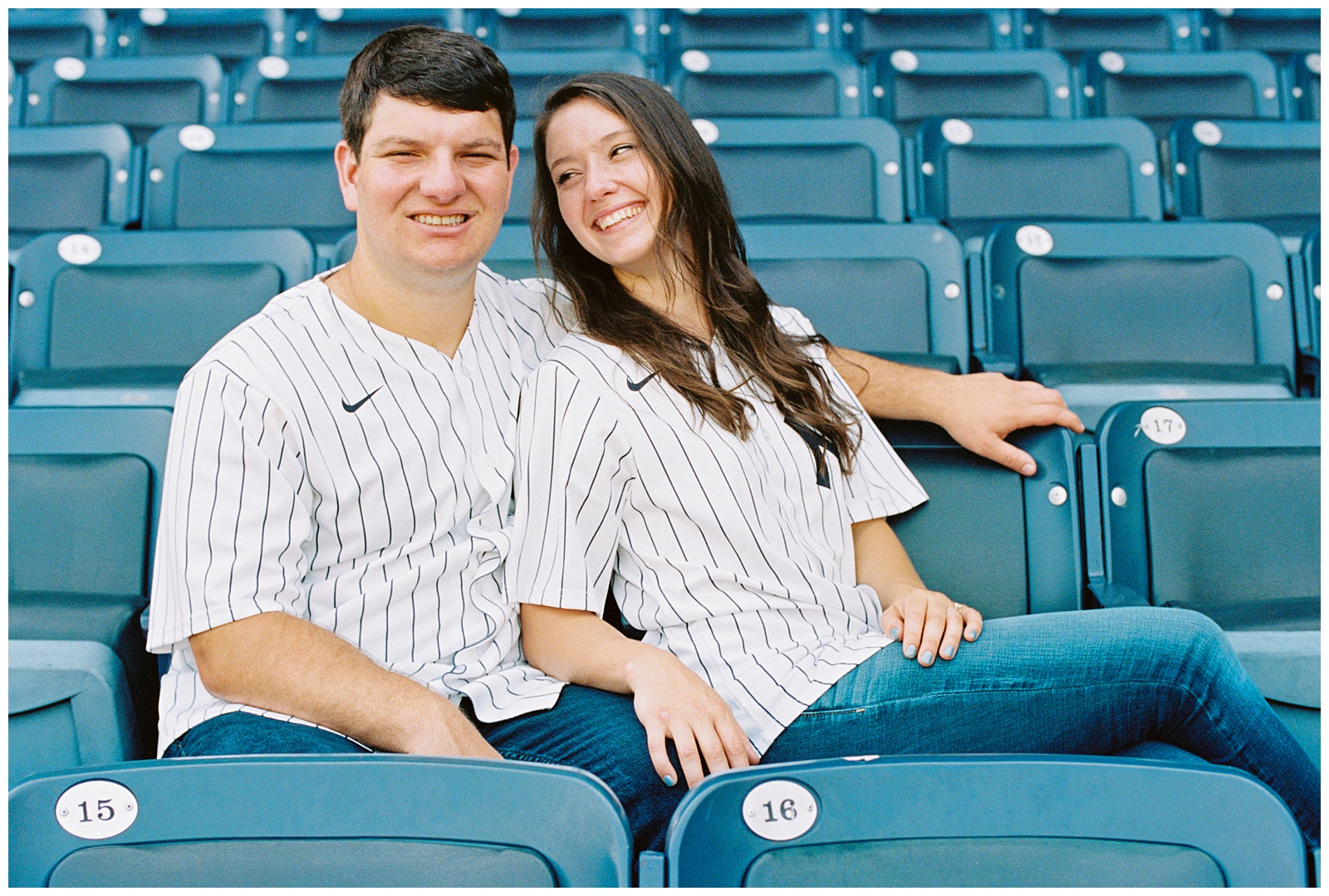 brid mand groom sit in seats at Yankee Stadium in the Bronx