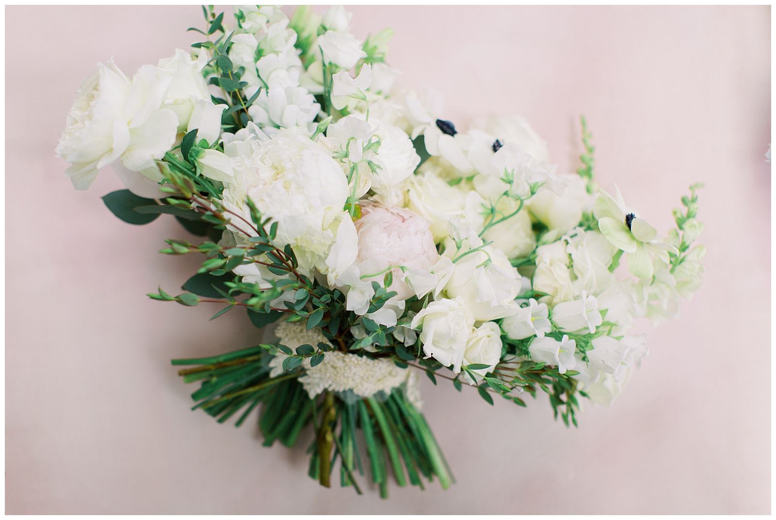 bride's wedding bouquet of white flowers 