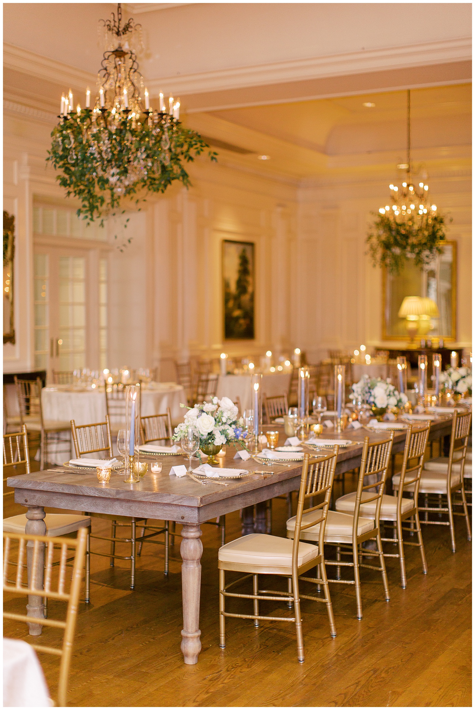 Quail Hollow Country Club wedding reception table with blue and gold details 
