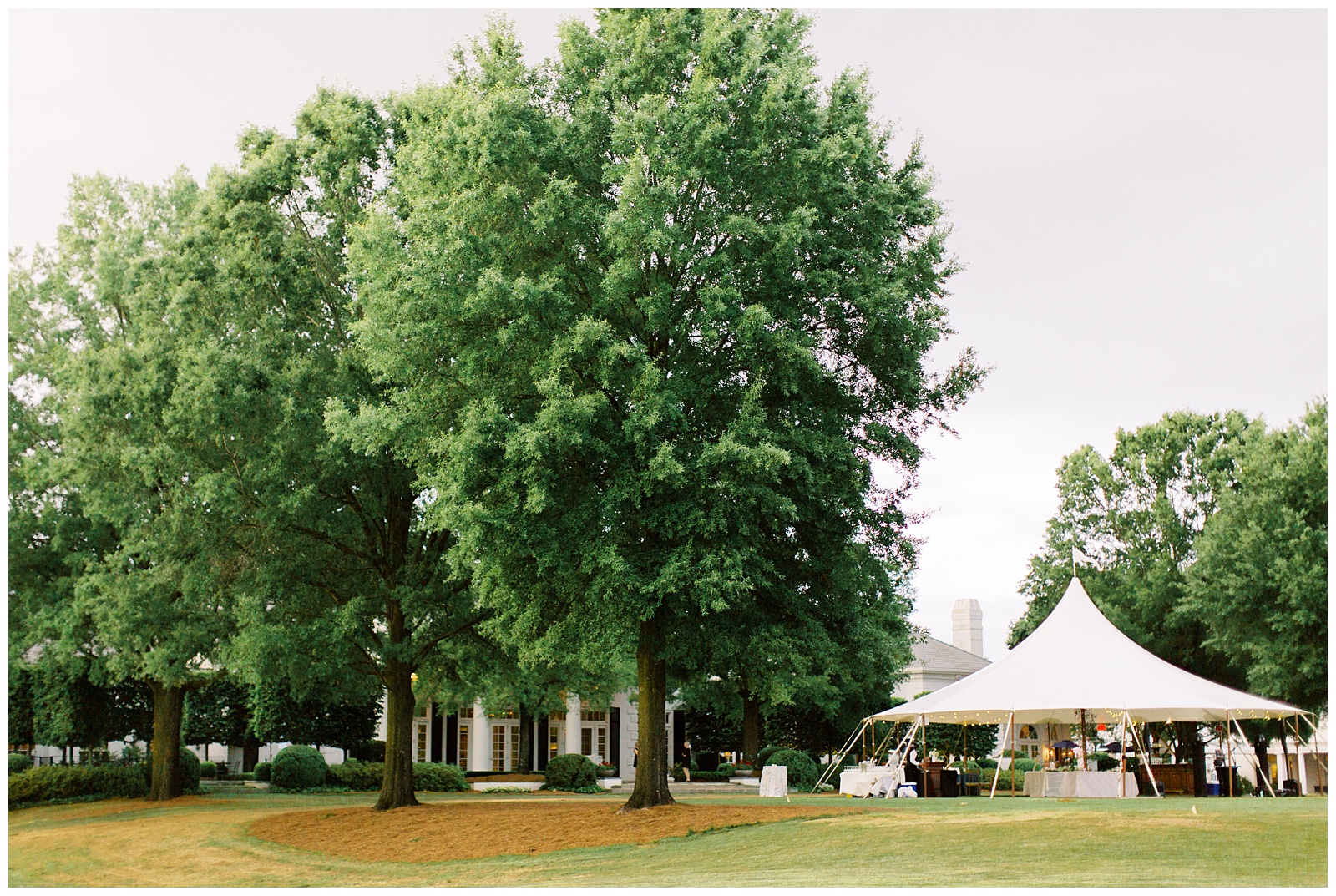 tented Charlotte NC wedding reception at Quail Hollow Country Club