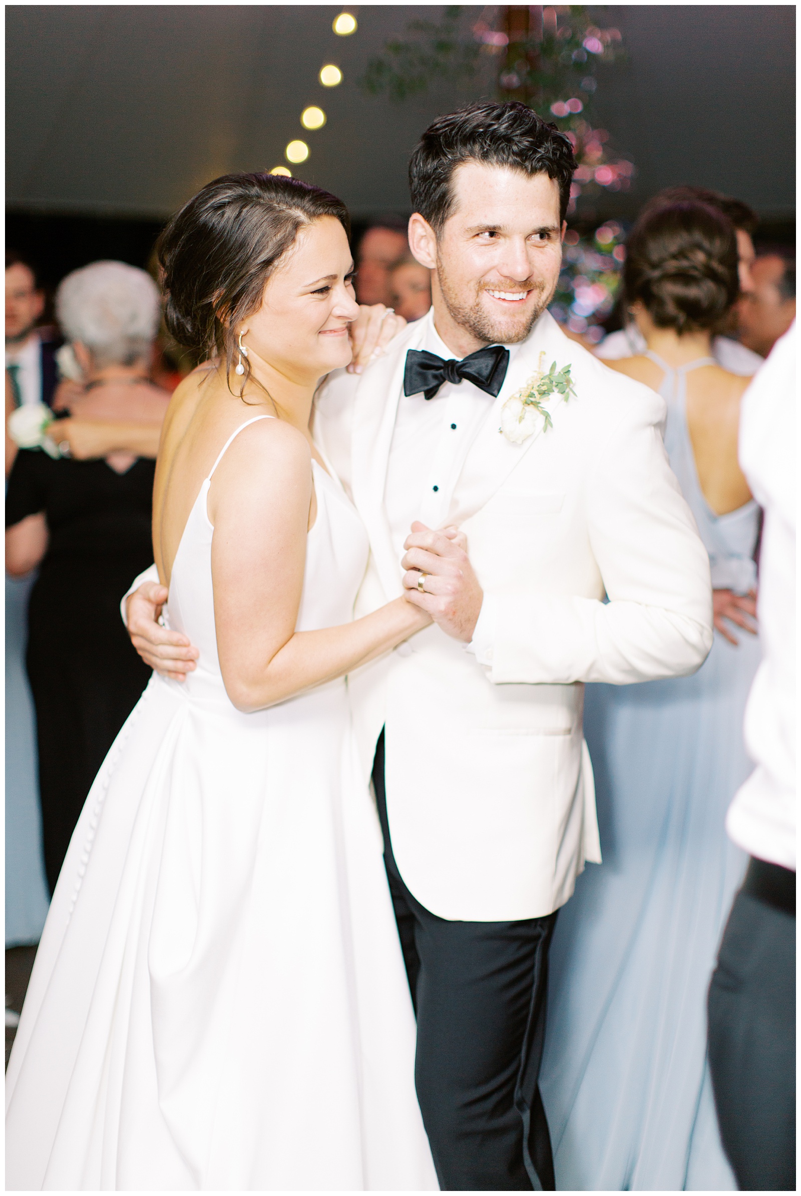 bride and groom dance during Charlotte NC wedding reception