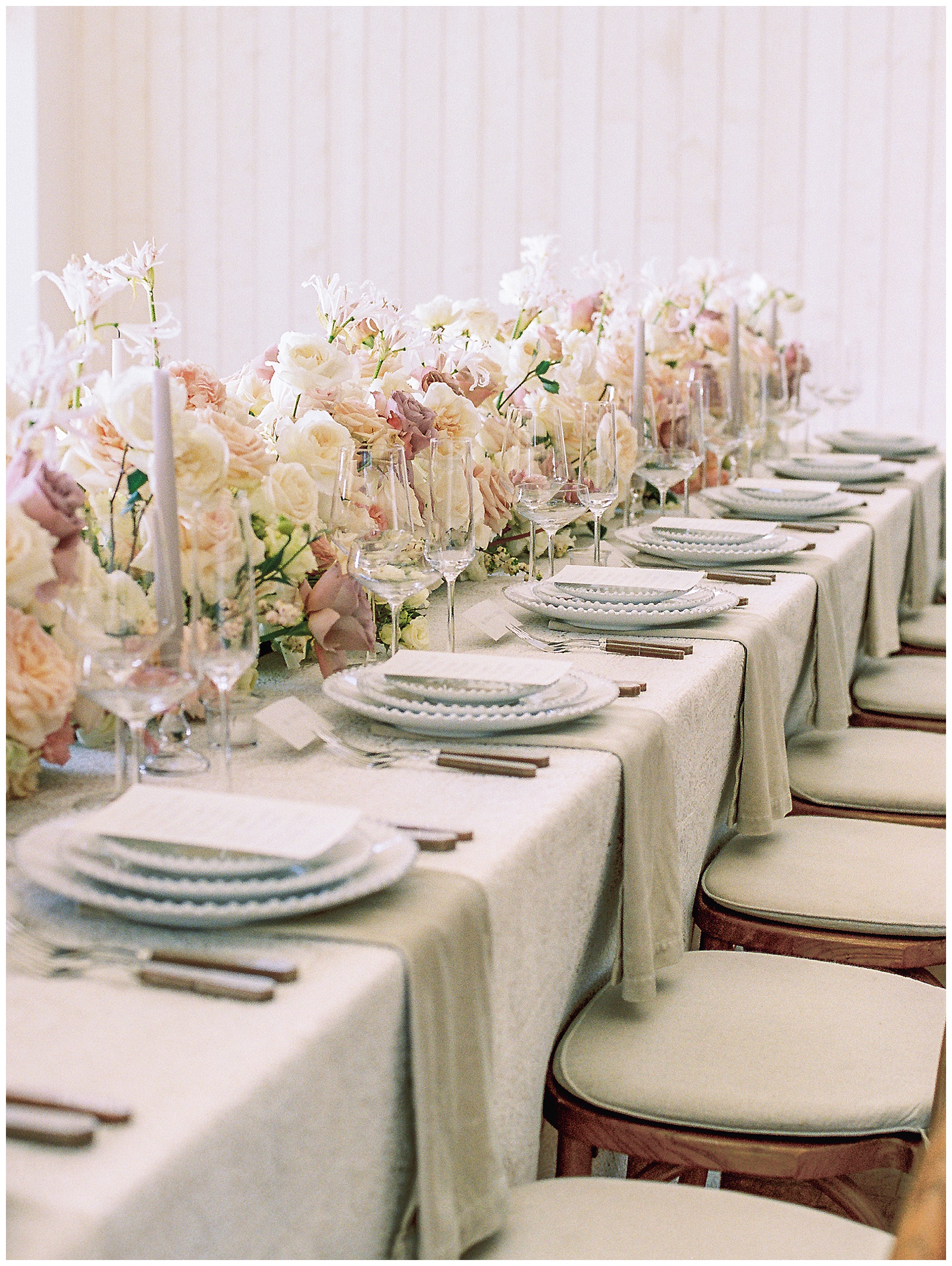 place settings for wedding reception along family style table