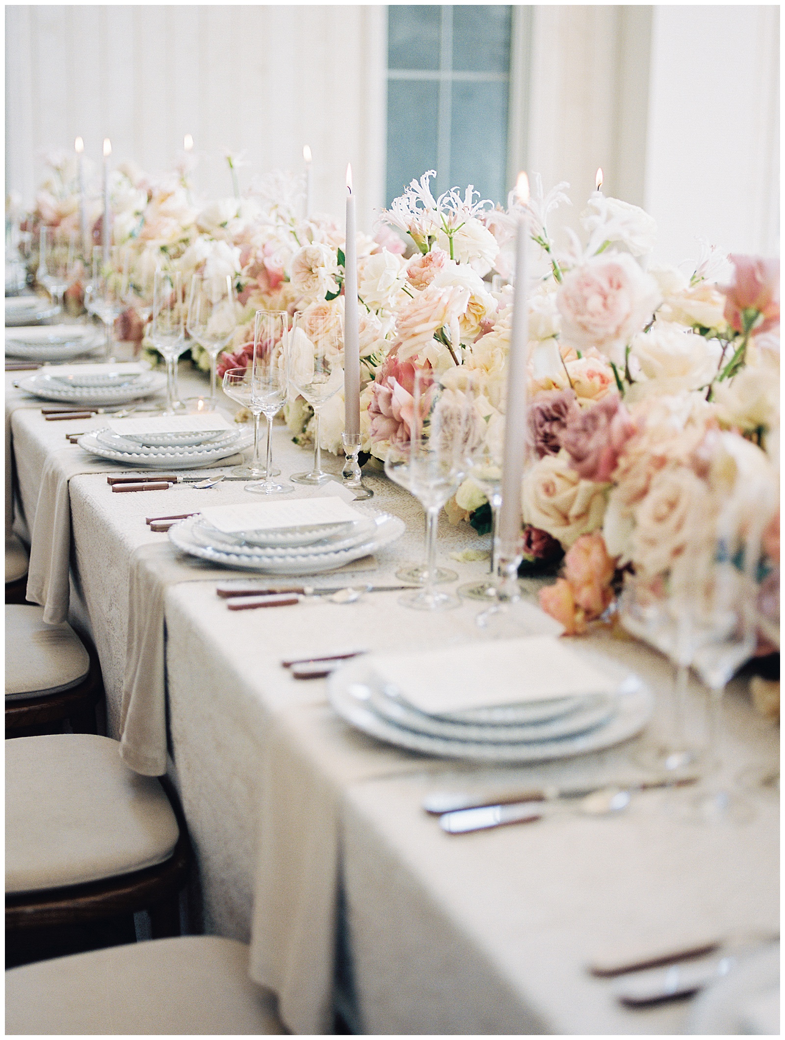 wedding reception with floral centerpieces at River Bottoms Ranch 