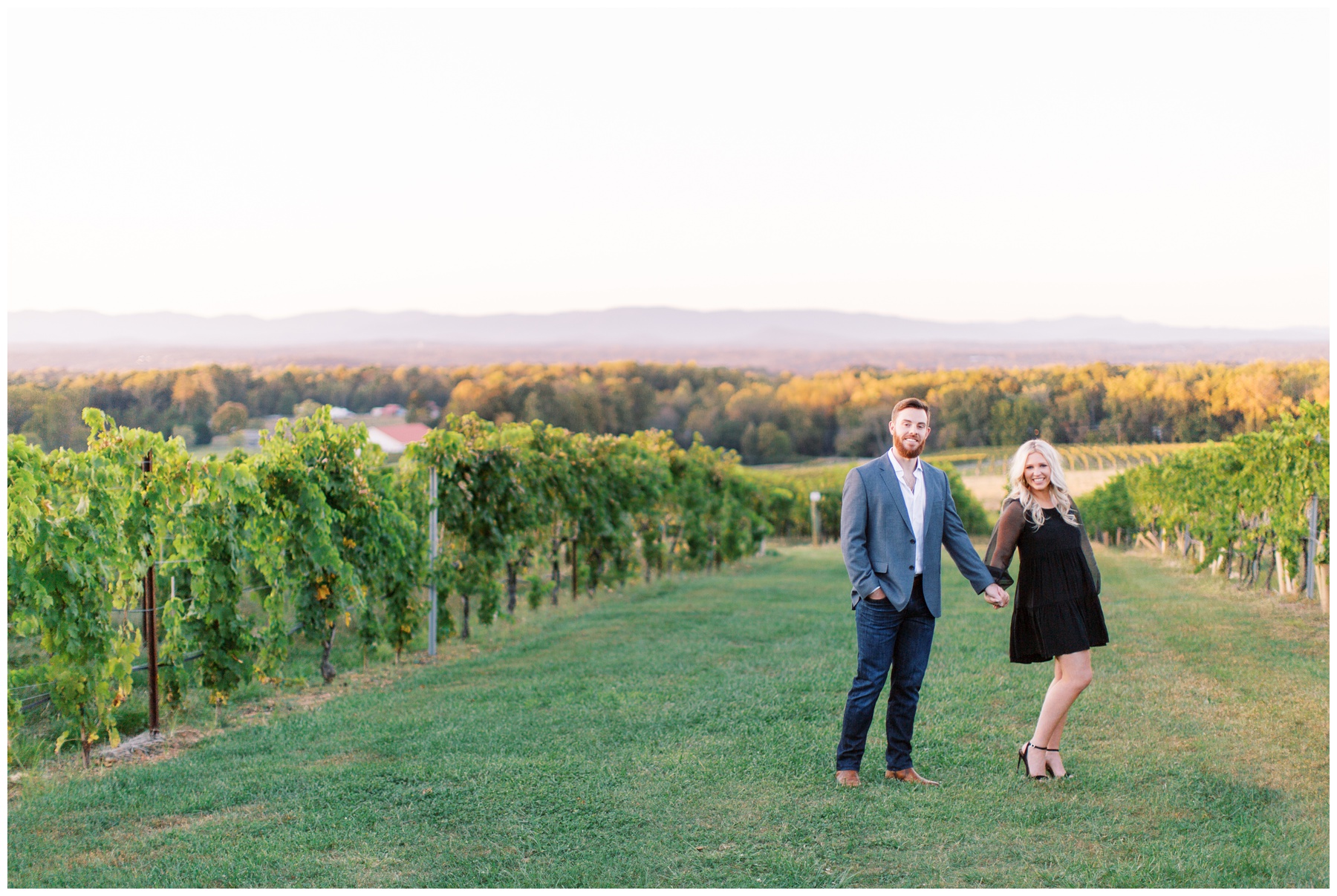 bride and groom hold hands standing in vines at Raffaldini Vineyards
