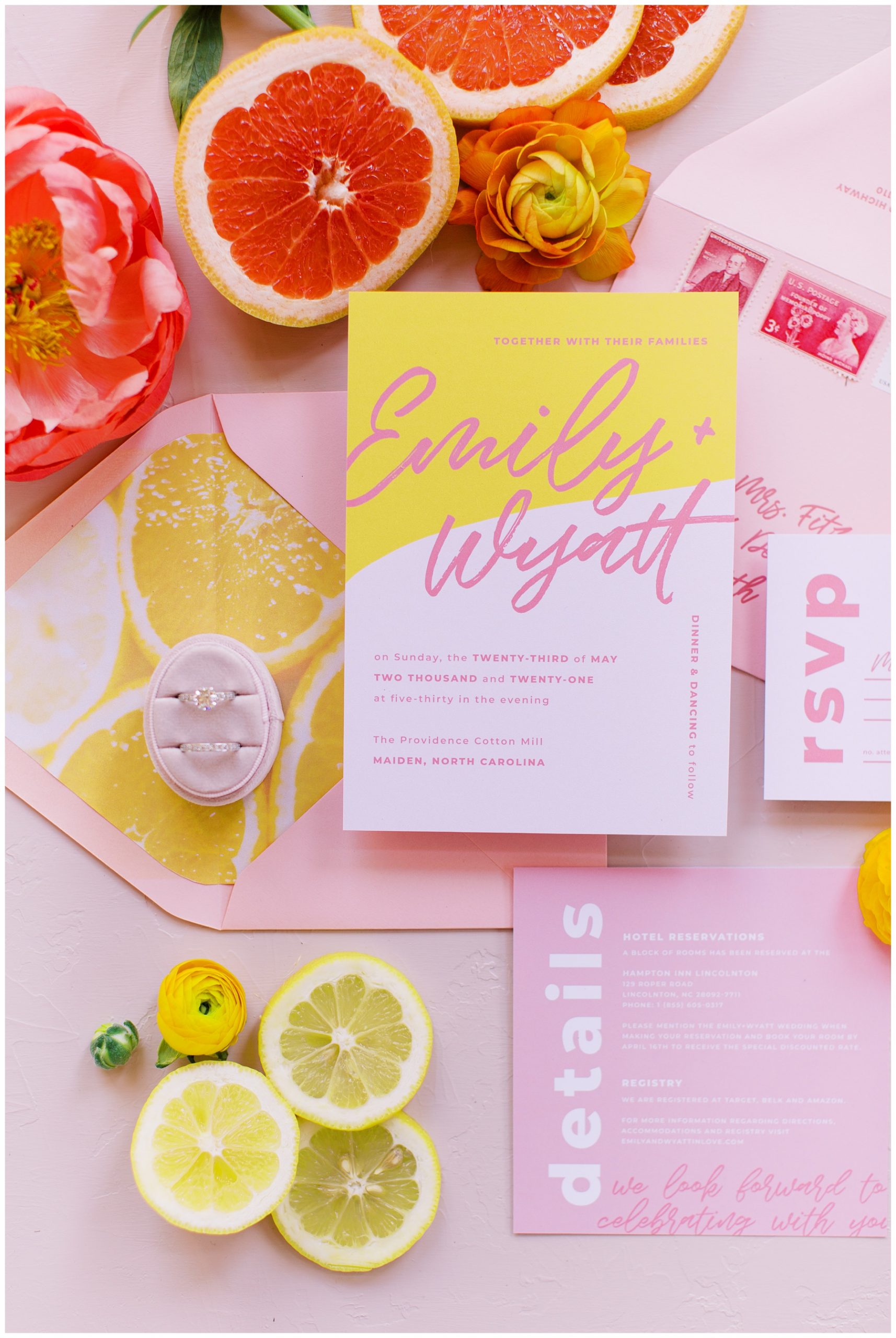 bright citrus inspired pink and yellow invitation suite for wedding day