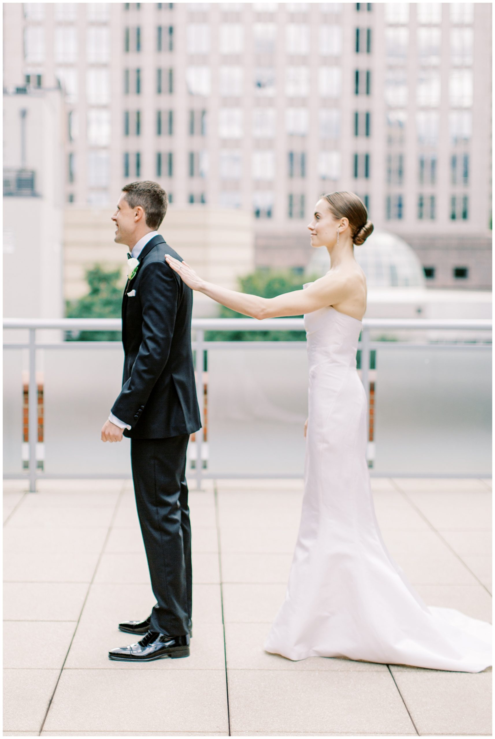 bride taps groom for first look in Charlotte NC