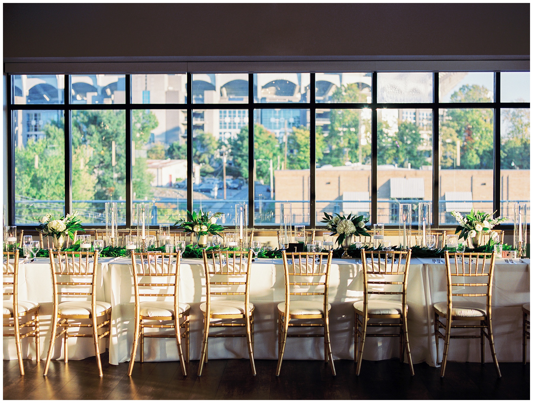 long table with gold chiviari chairs at The Terrace at Cedar Hill