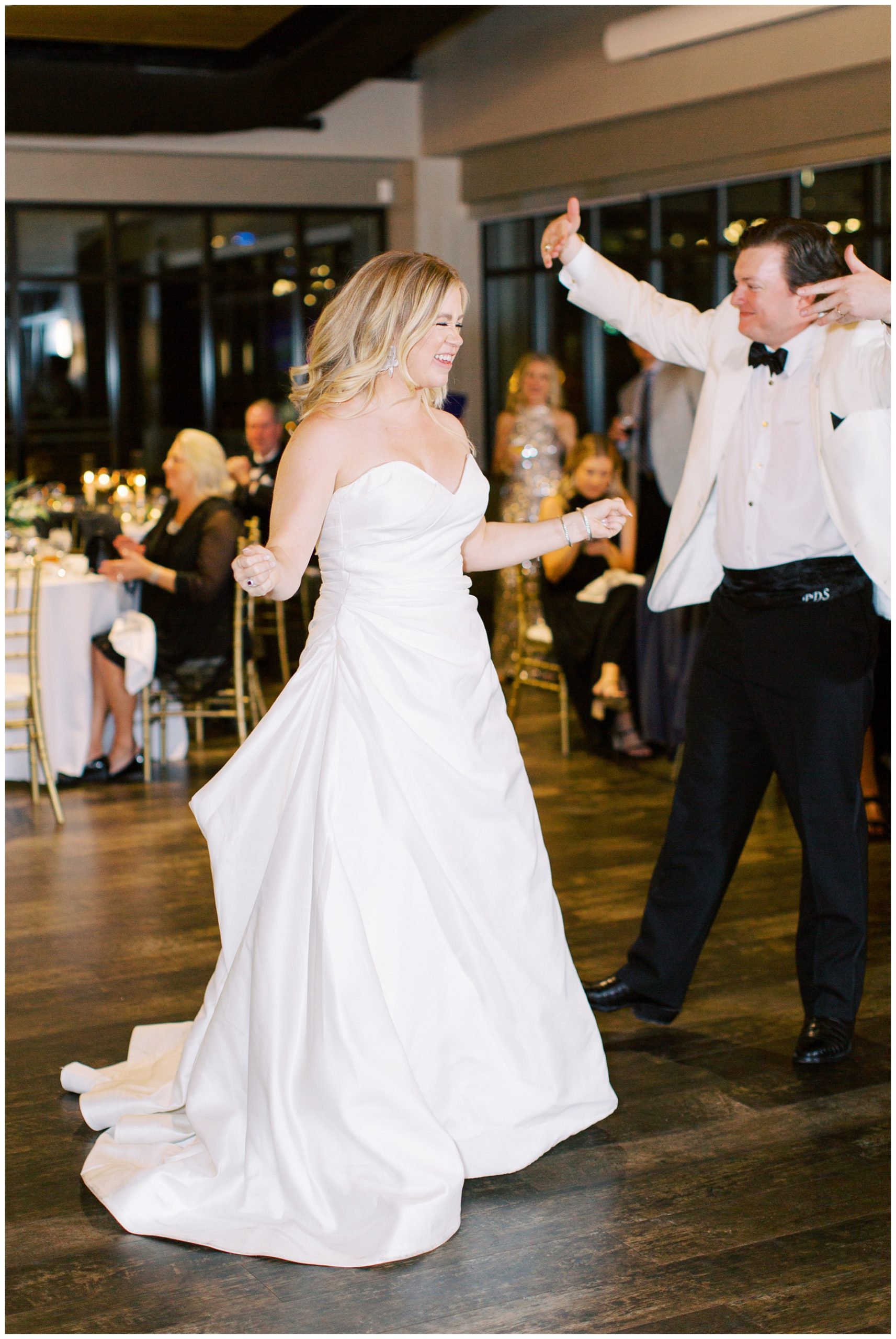 bride and groom dance together during Charlotte NC reception 