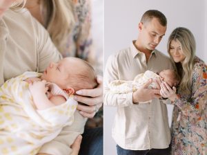 new parents look at baby girl during Charlotte newborn session at home
