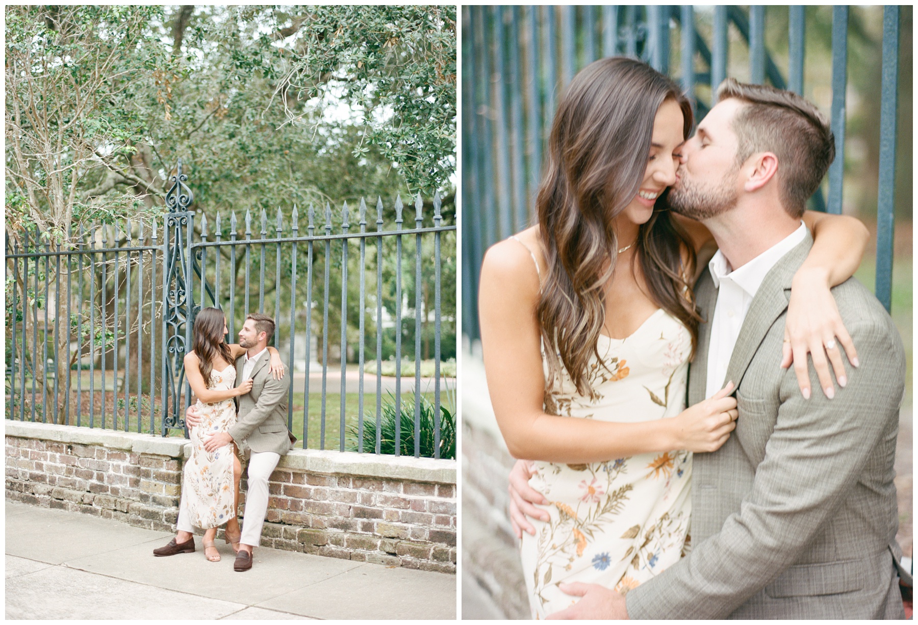 bride in floral dress sits on groom's knee on brick wall by wrought iron fence in Downtown Charleston