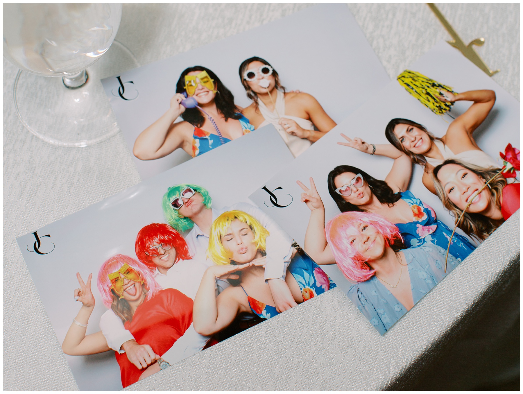 printed photos from photo booth from summer reception at The Bradford