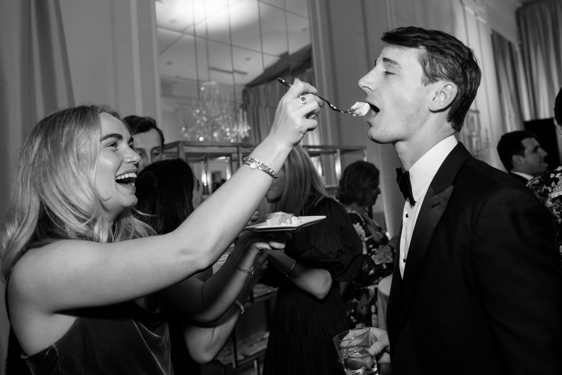 wedding guests eat wedding cake 