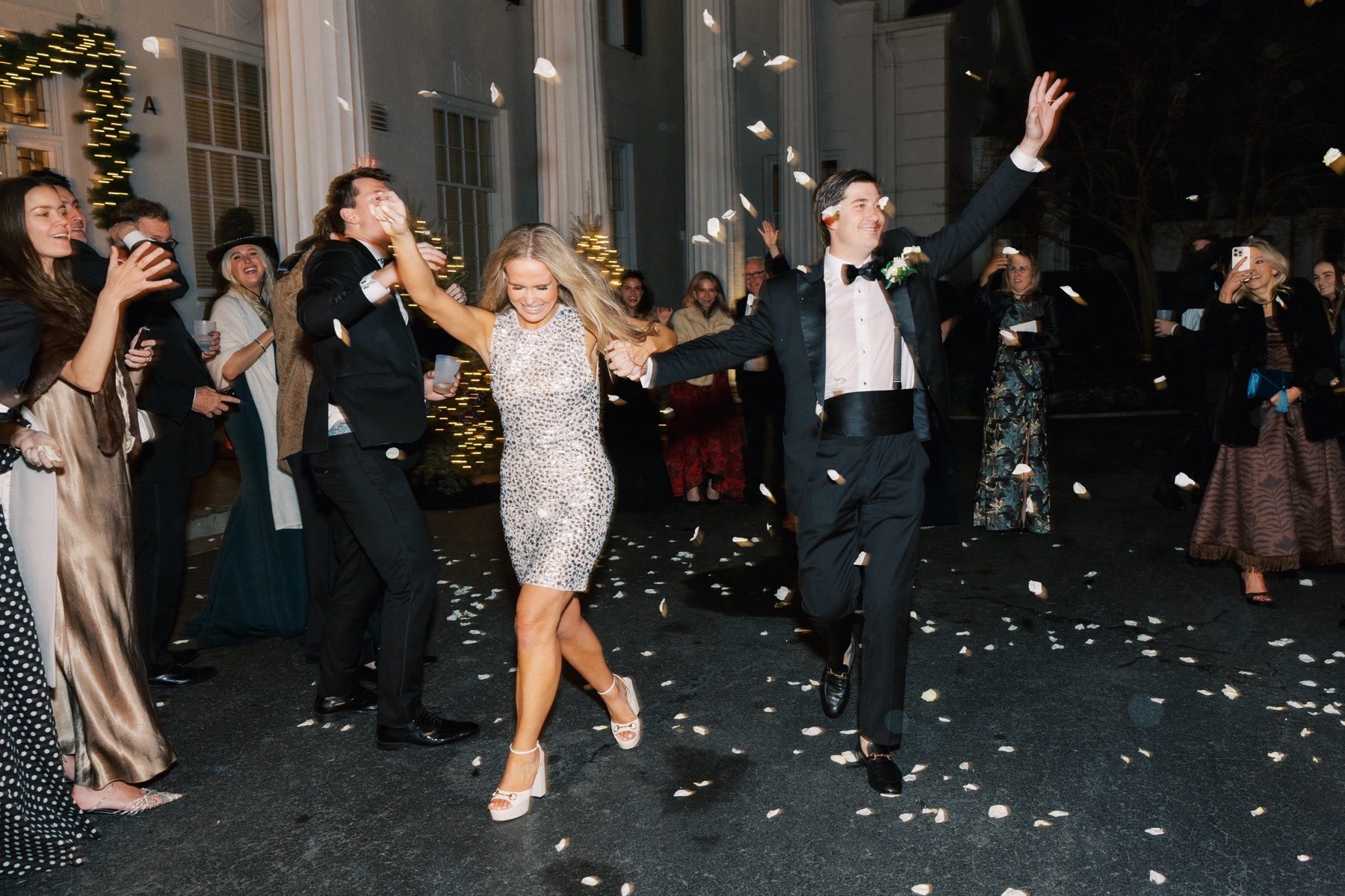 Newlyweds exit wedding reception 