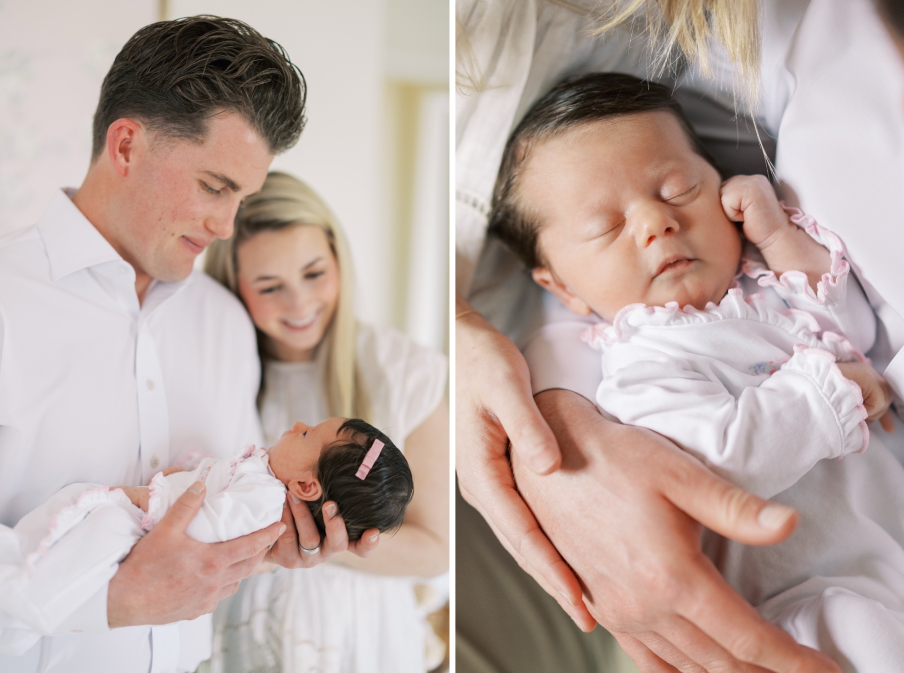 mother & father look at baby girl