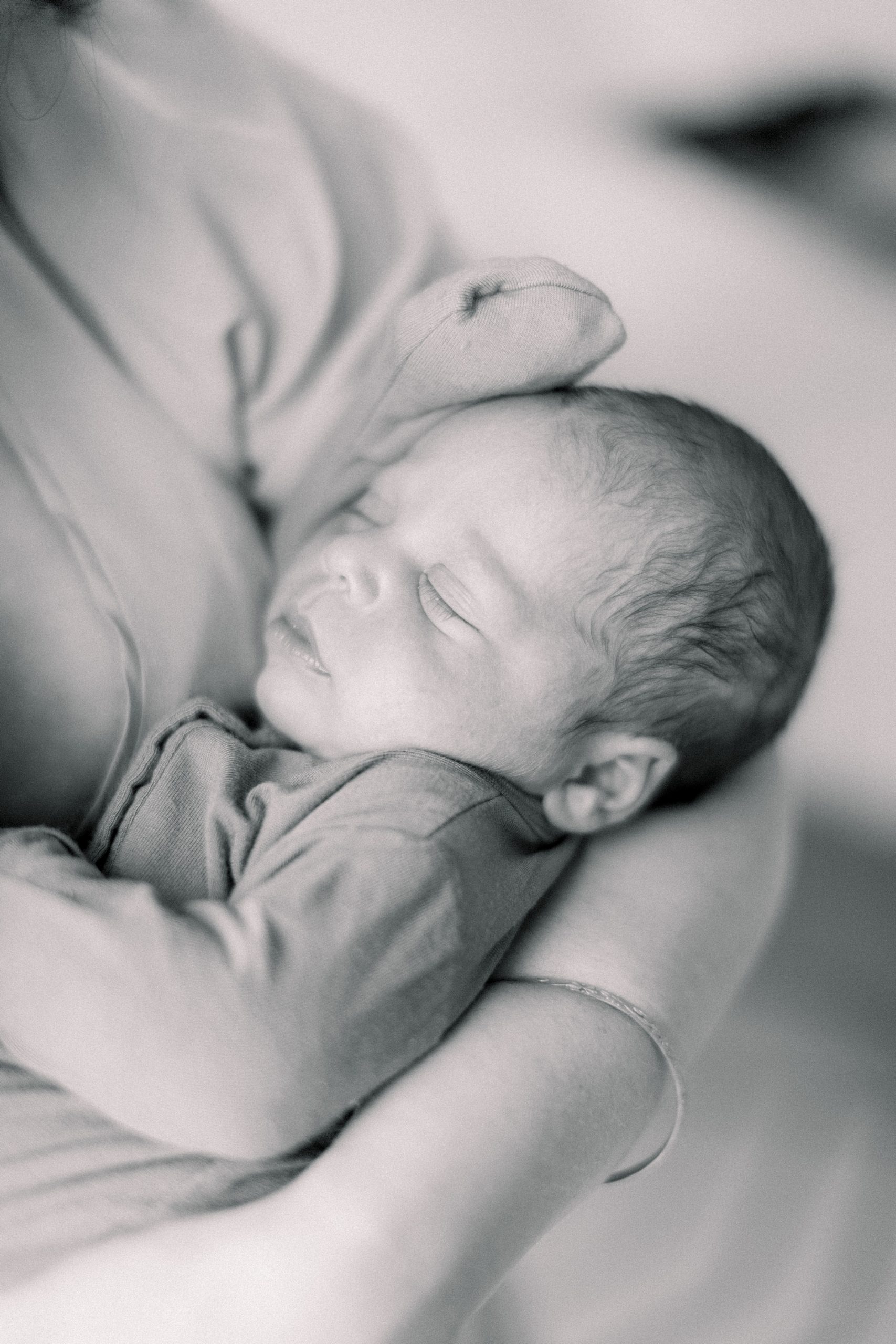 baby sleeps during Charlotte lifestyle newborn session
