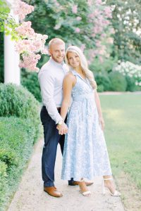 bride leans against groom during spring Duke Mansion engagement session