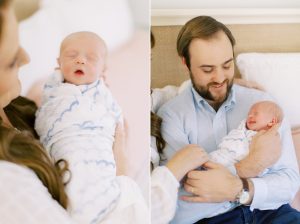 parents hold baby boy on bed during lifestyle photos at home