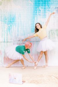 ballet teacher helps dancer adjust turnout