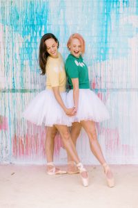 dancers from EveryBODIES Ballet hold hands and point toes