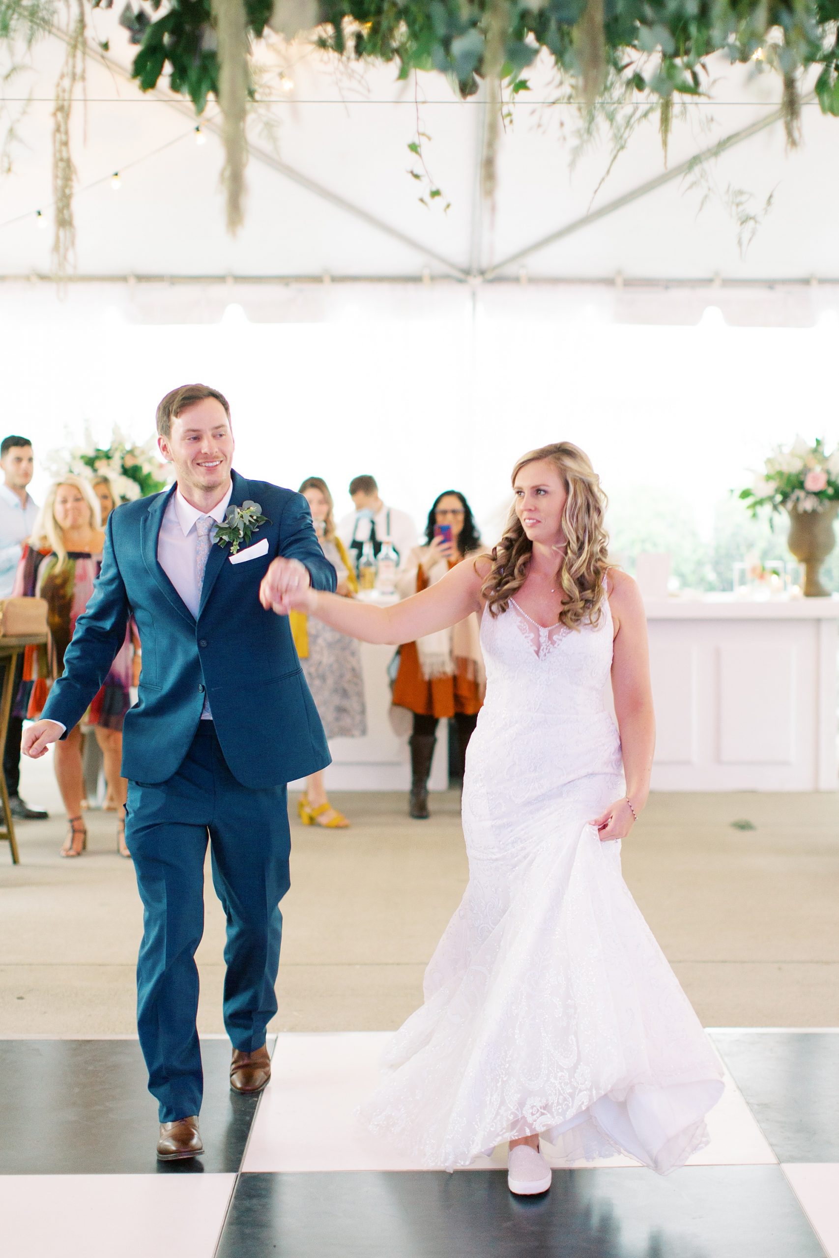 bride and groom enter wedding reception in South Carolina