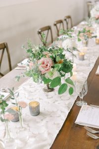 The Dairy Barn wedding reception details with rose centerpieces