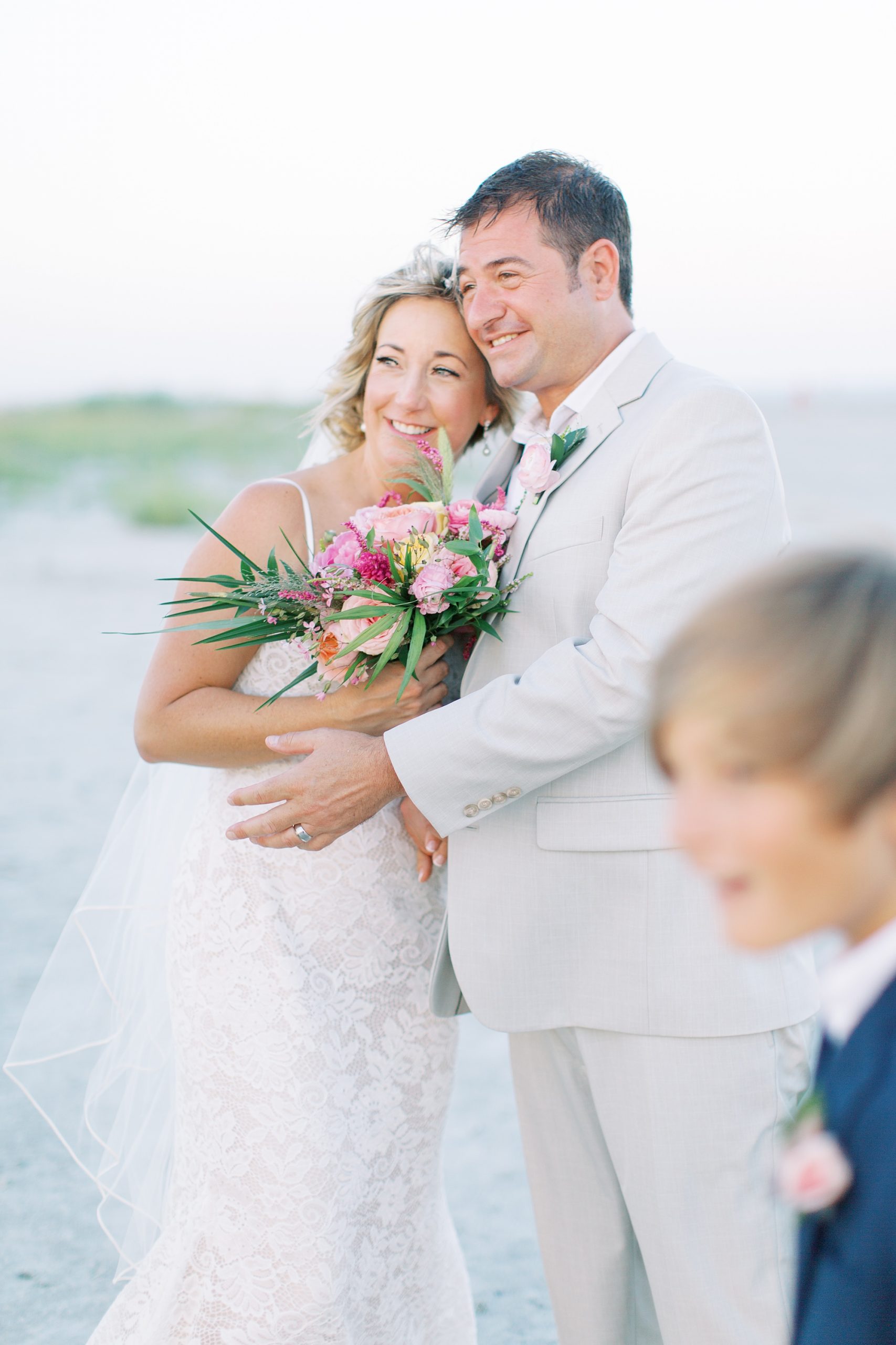 bride leans on groom during Charleston microwedding