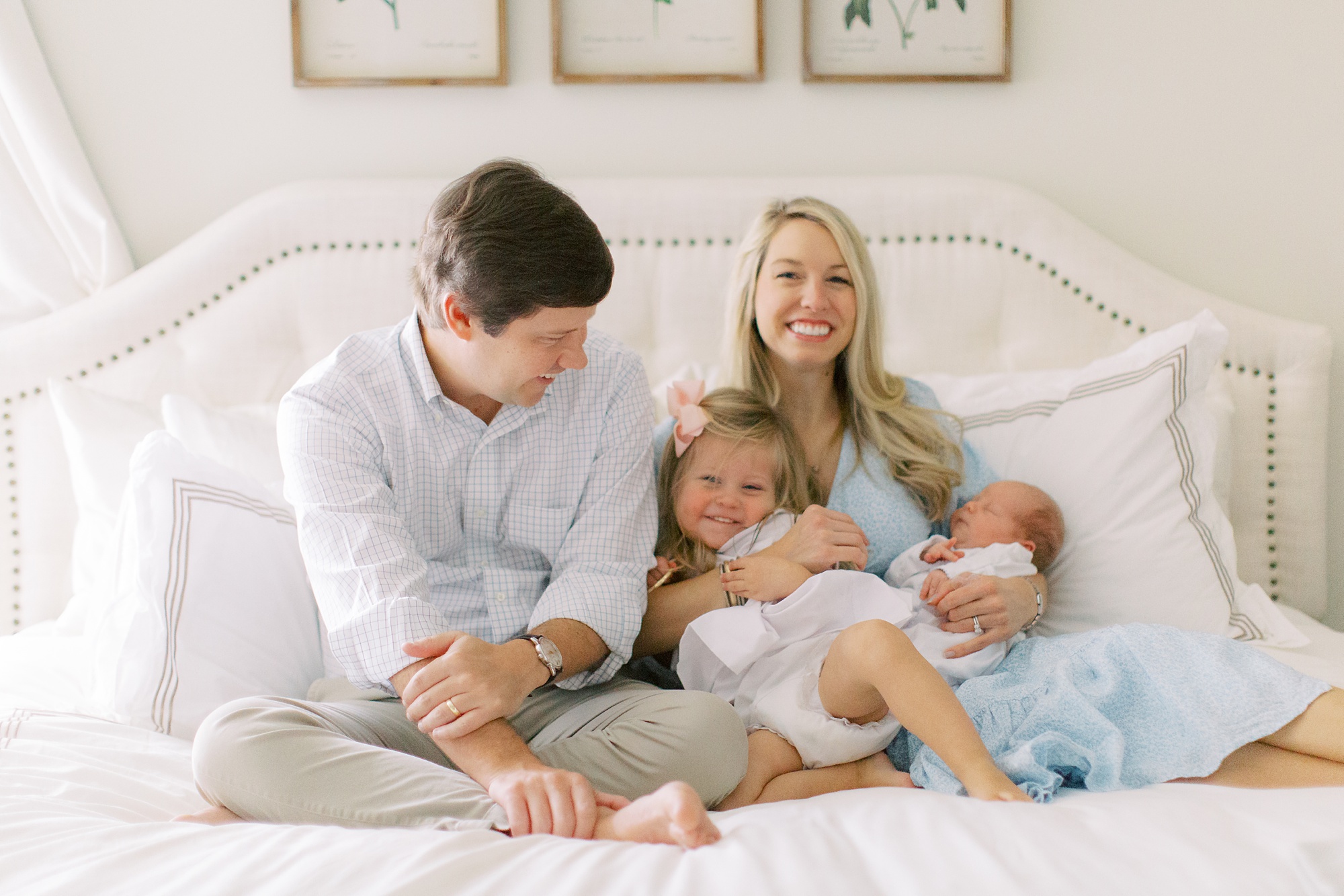 lifestyle newborn photos in Charlotte with parents and son