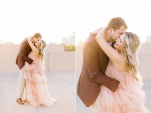 groom nuzzles bride during uptown Charlotte NC engagement photos