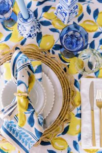 blue and yellow place settings for Charlotte product photography session