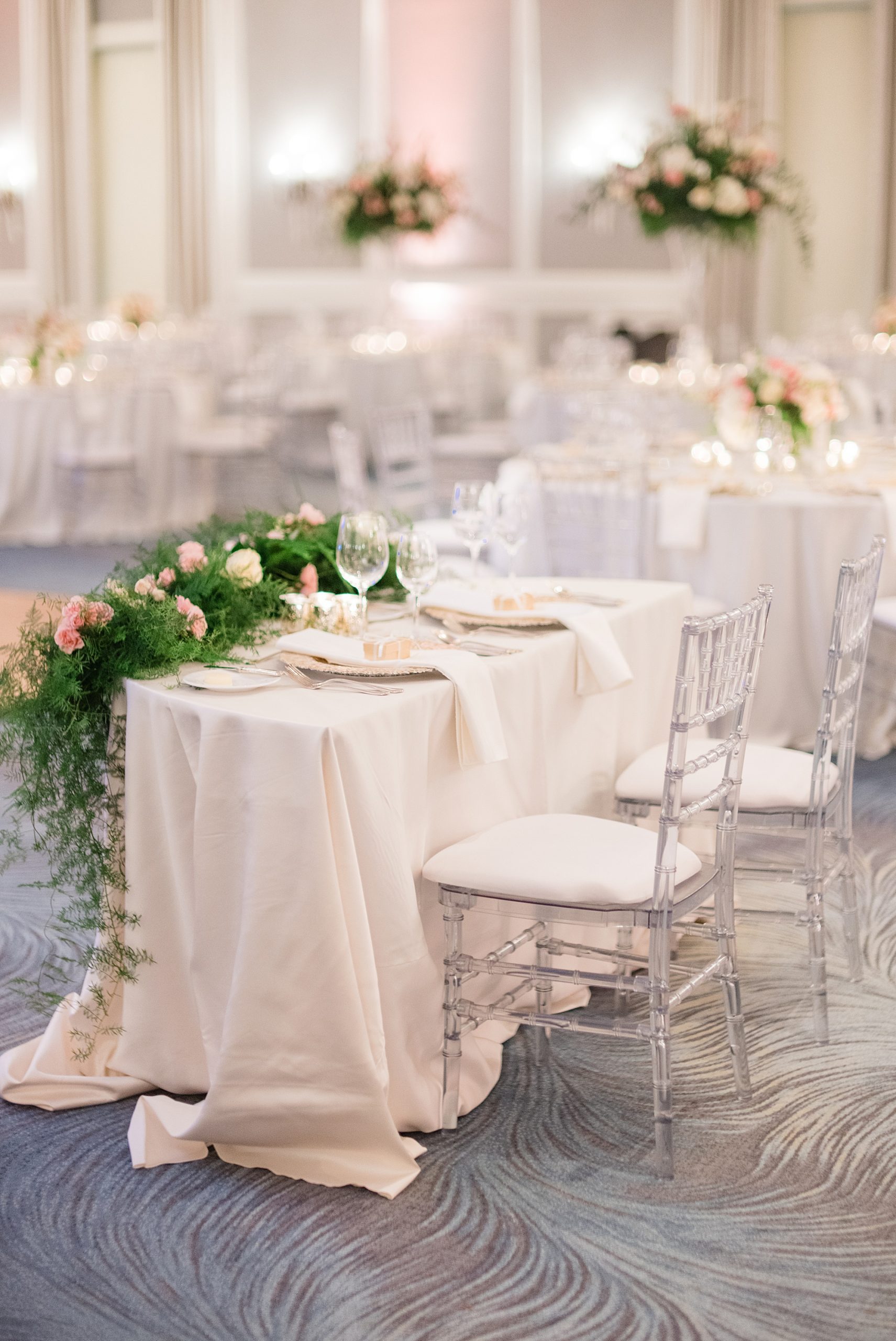 sweetheart table with silver chivari chairs