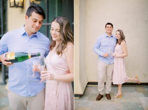 couple pops champagne during Lake Norman engagement session