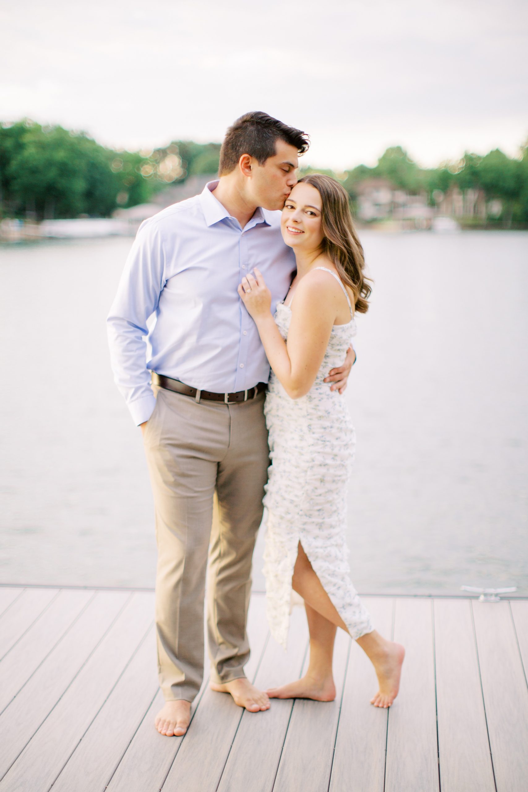 engagement portraits on dock at Lake Norman