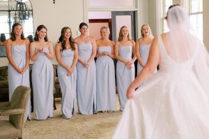 bridesmaids have first look with bride before VanLandingham Estate wedding