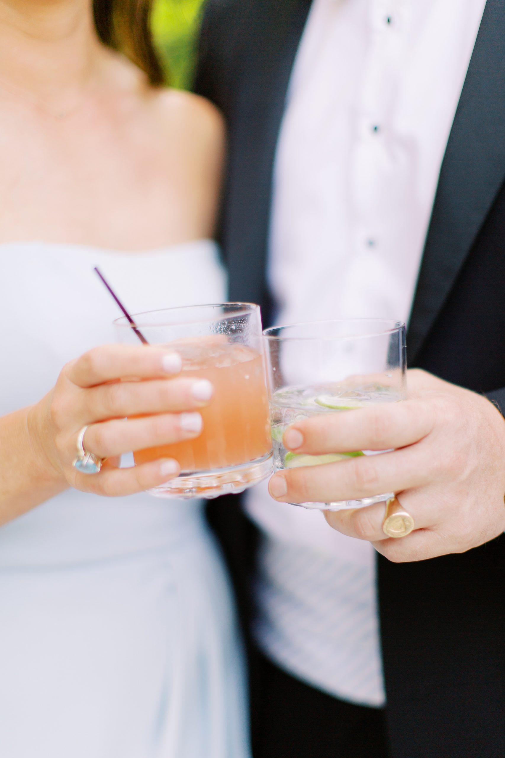 newlyweds toast signature drinks during Charlotte wedding reception