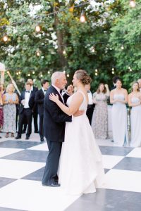 bride dances with dad during VanLandingham Estate wedding reception