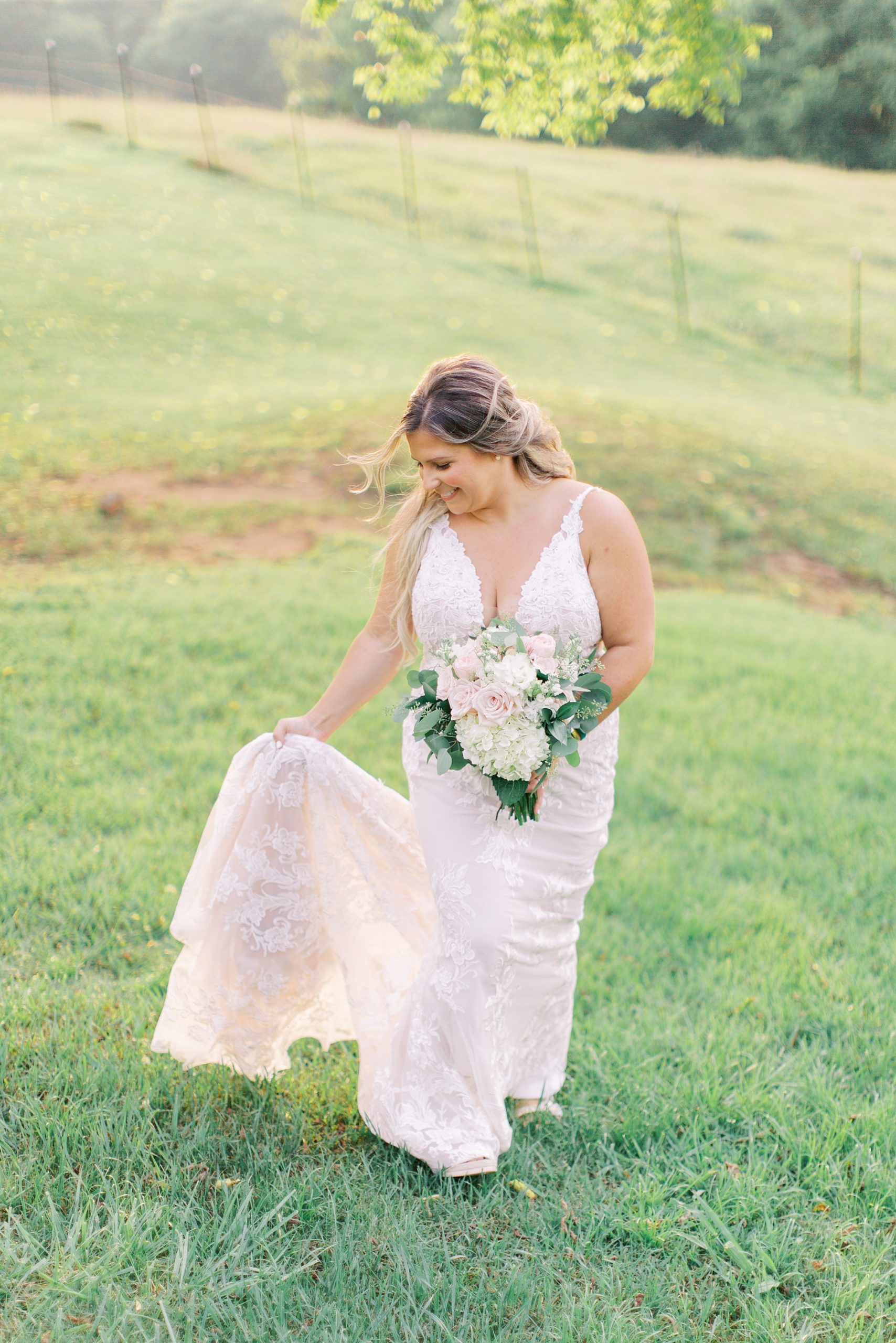 bride twirls wedding gown at The Dairy Barn