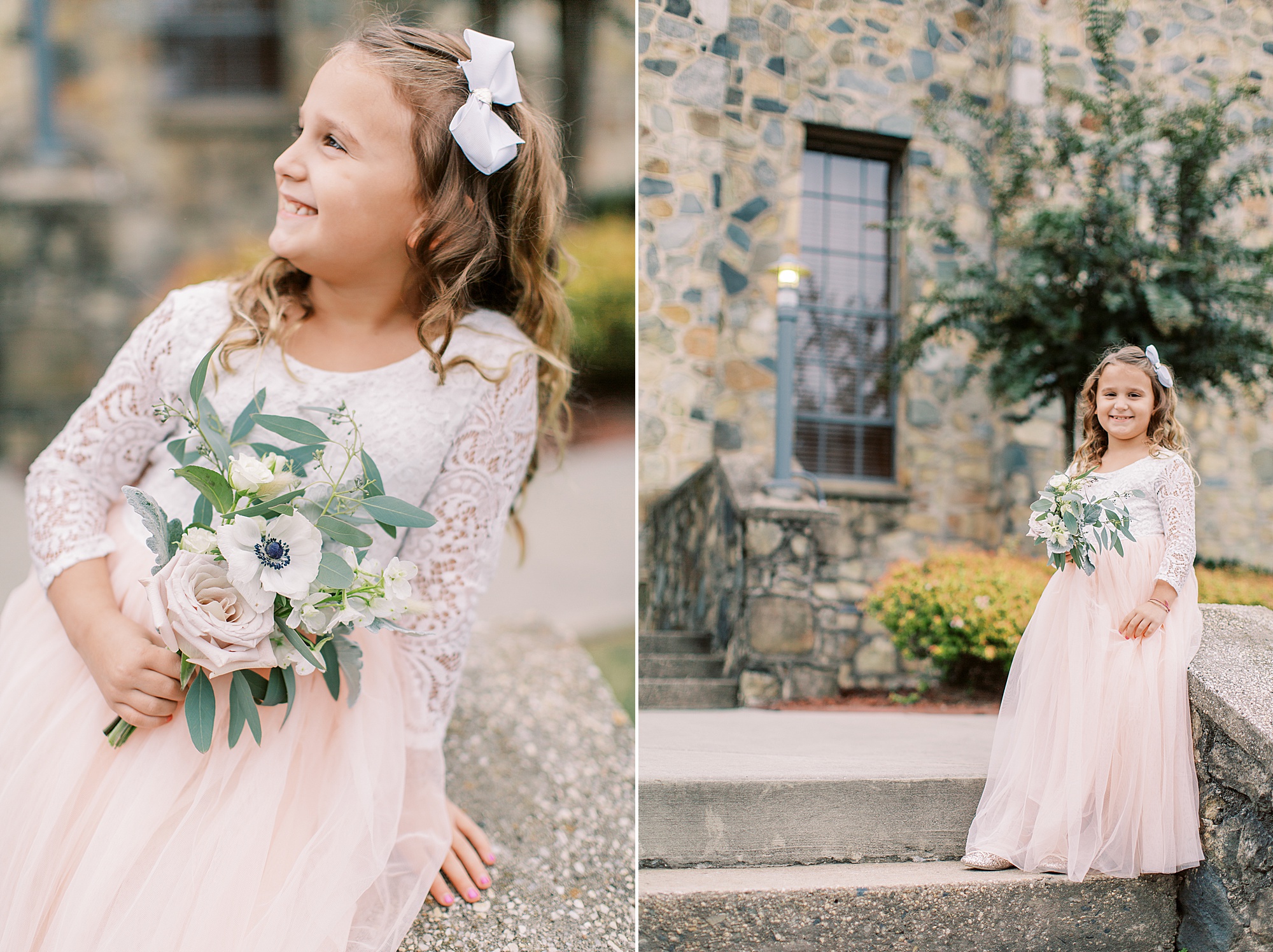 daughter in pink flower girl dress poses on stone steps at The Palmer Building