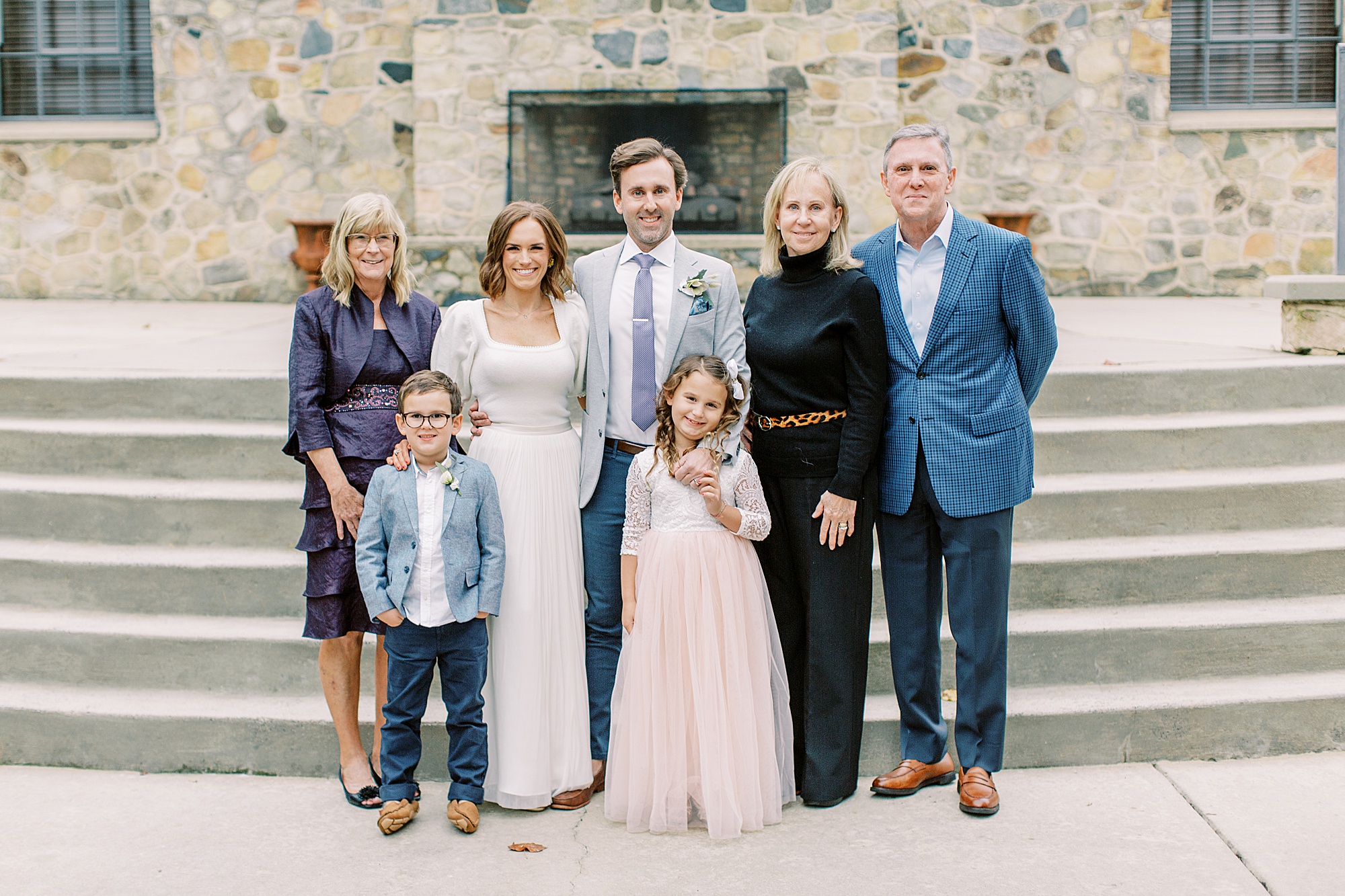 family poses together during vow renewal