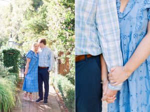 couple holds hands standing in gardens at Duke Mansion