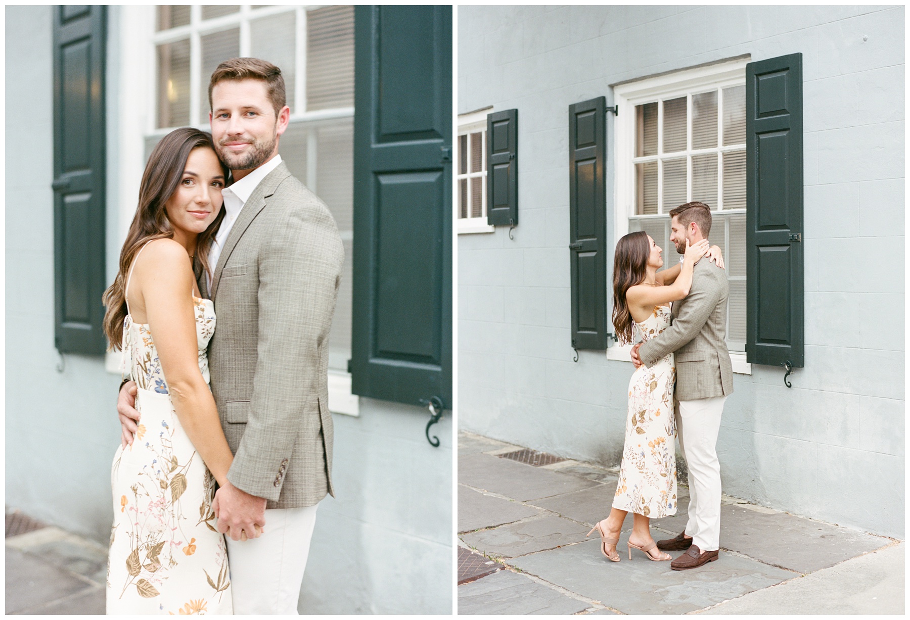 engaged couple hugs outside blue house in Downtown Charleston on rainy day 