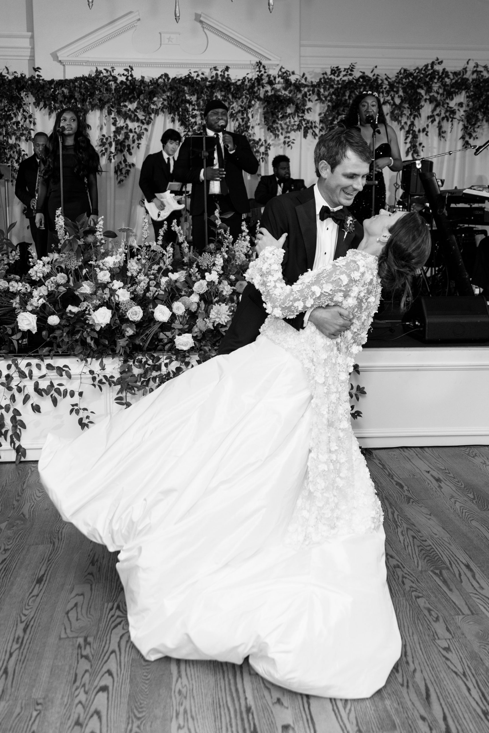 candid photo of newlyweds on the dance floor